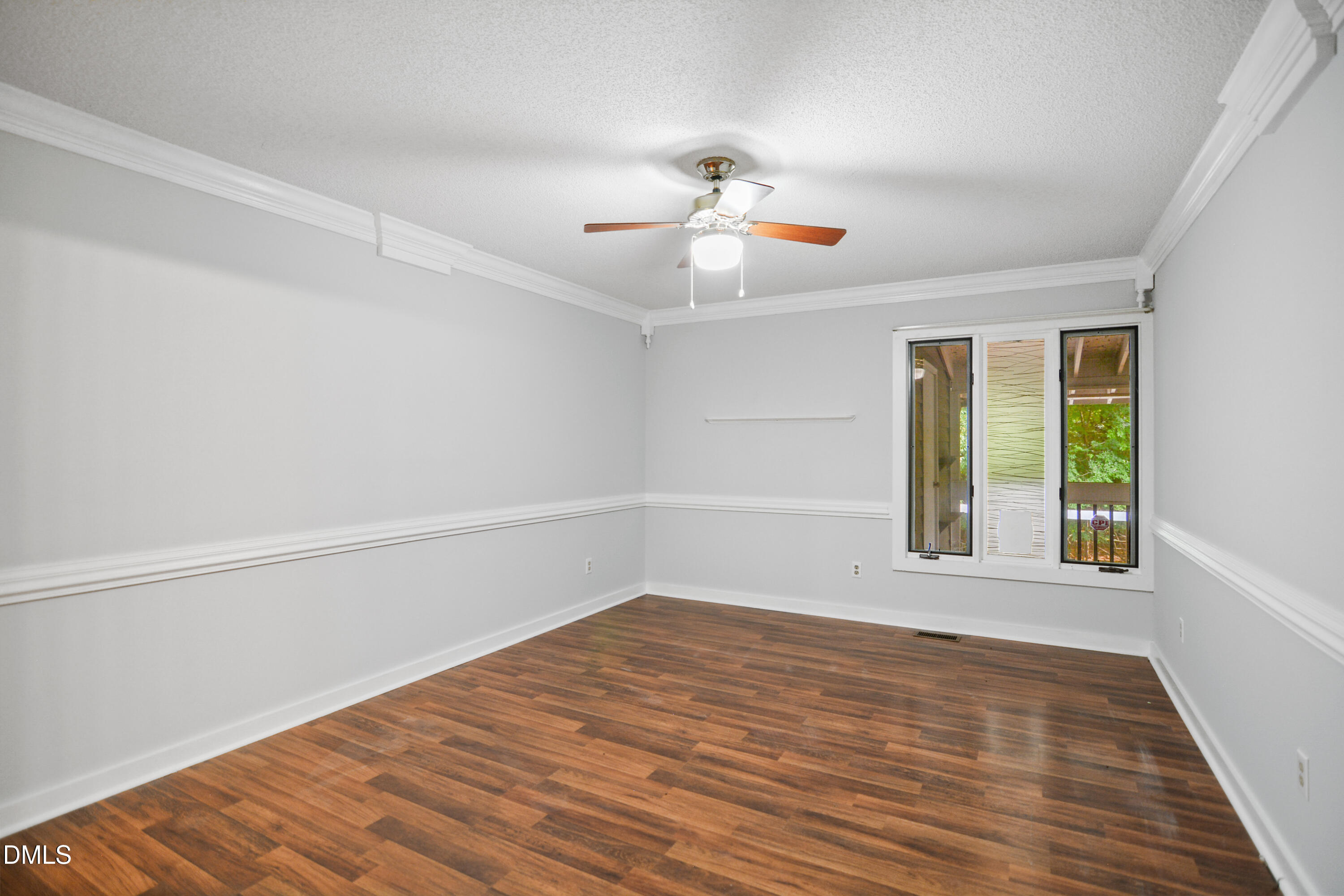 3614 Top Of The Pines Court Raleigh, NC 27604 - Photo 12 of 20 wooden floor in an empty room with a window