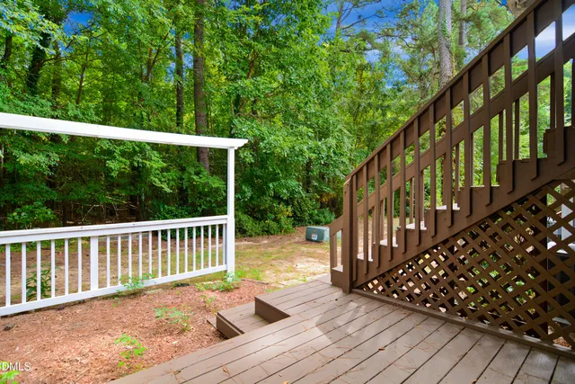 a view of entryway with wooden stairs