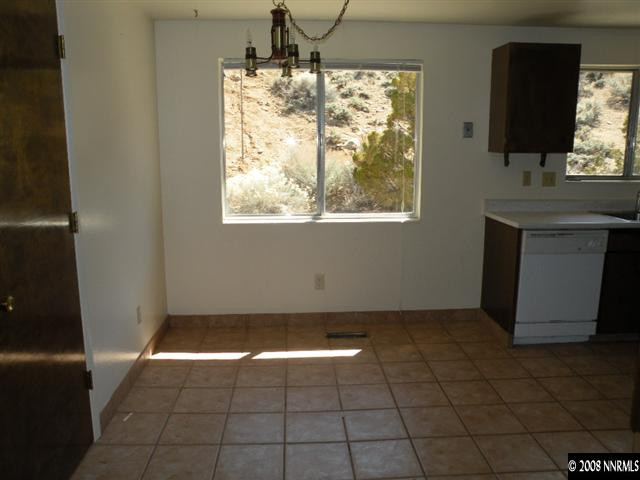 8830 Paloma Way Reno, NV 89506 - Photo 3 of 7 a view of an empty room with a window