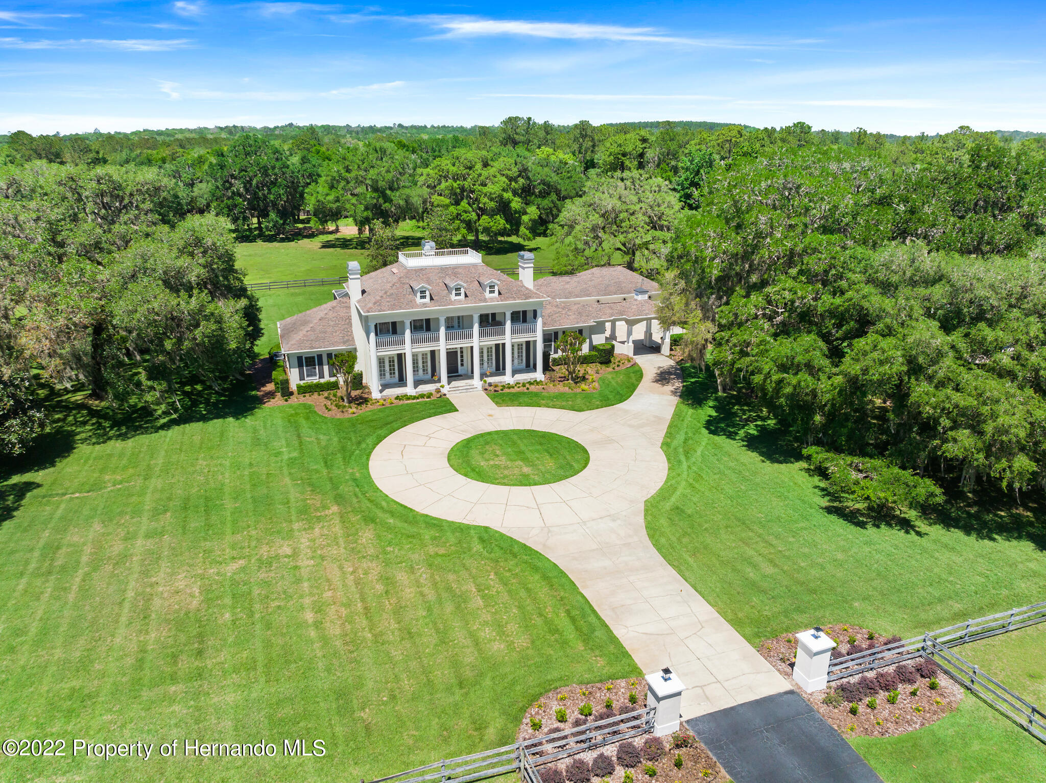 21411 Brookes Run Road Brooksville, FL 34602 - Photo 1 of 62 a view of a house with a big yard