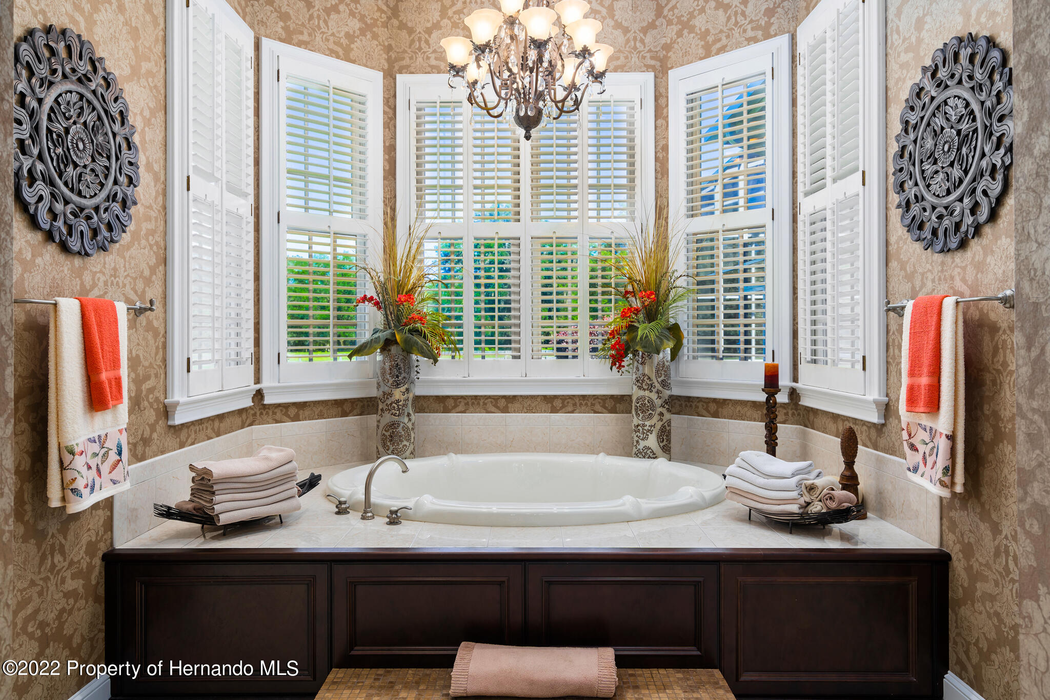 21411 Brookes Run Road Brooksville, FL 34602 - Photo 25 of 62 a bathroom with a sink and a mirror
