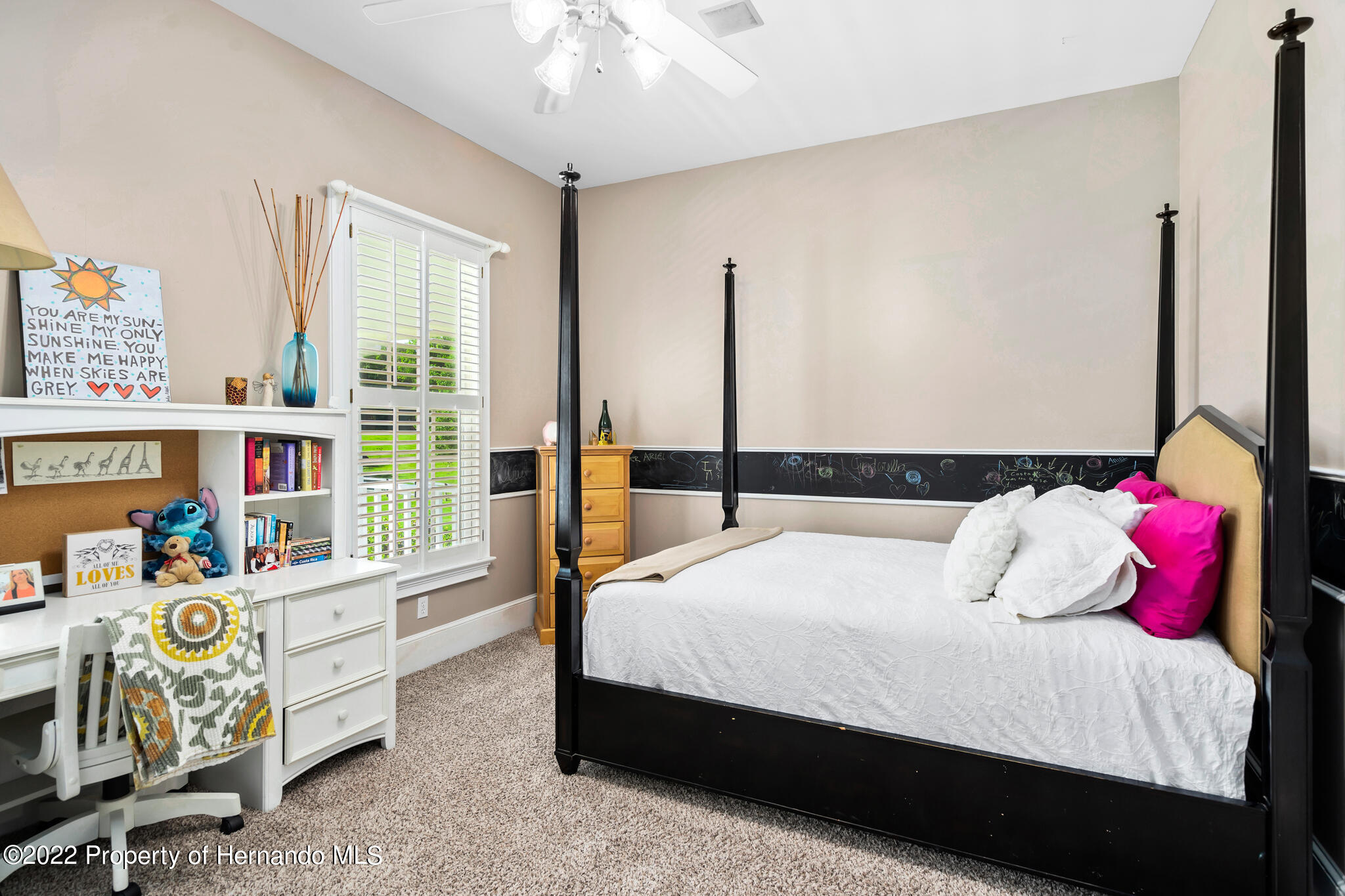 21411 Brookes Run Road Brooksville, FL 34602 - Photo 42 of 62 a bedroom with a bed and a window