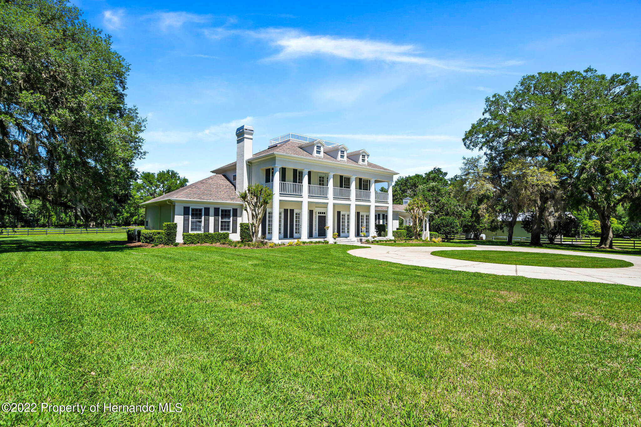 21411 Brookes Run Road Brooksville, FL 34602 - Photo 58 of 62 a view of a house with a yard