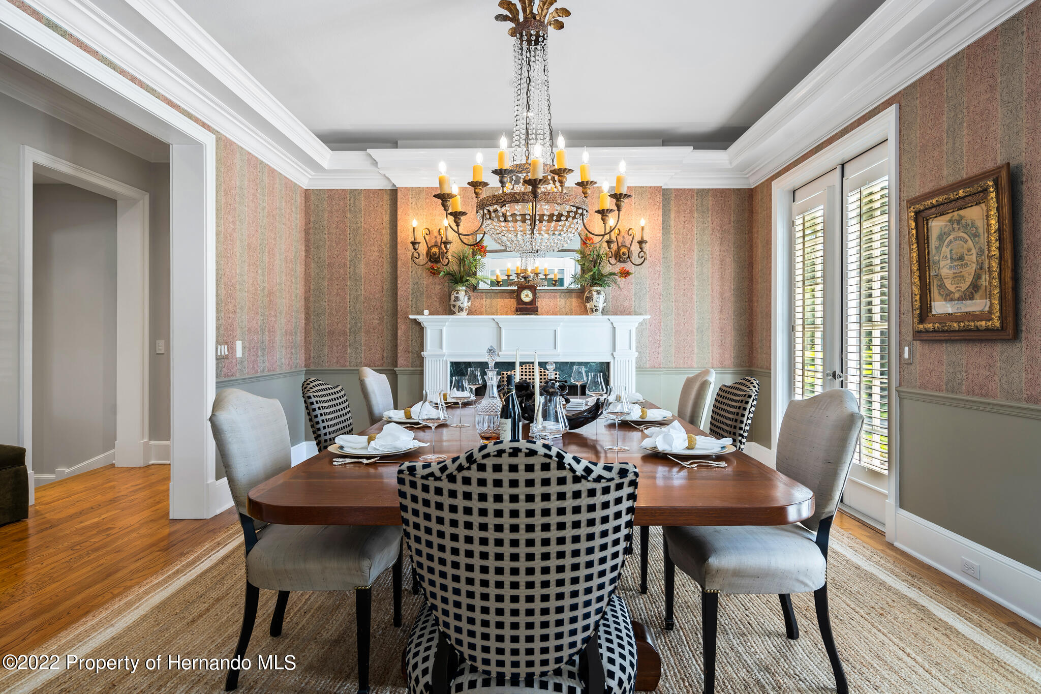 21411 Brookes Run Road Brooksville, FL 34602 - Photo 6 of 62 a view of a dining room with furniture wooden floor and chandelier