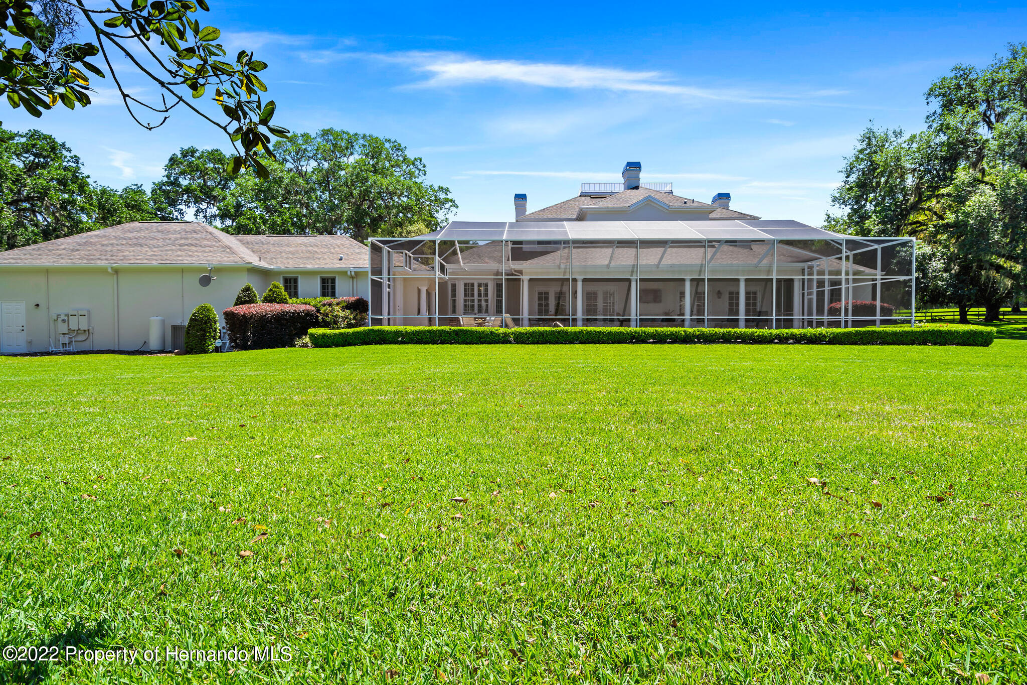 21411 Brookes Run Road Brooksville, FL 34602 - Photo 61 of 62 a front view of a house with garden