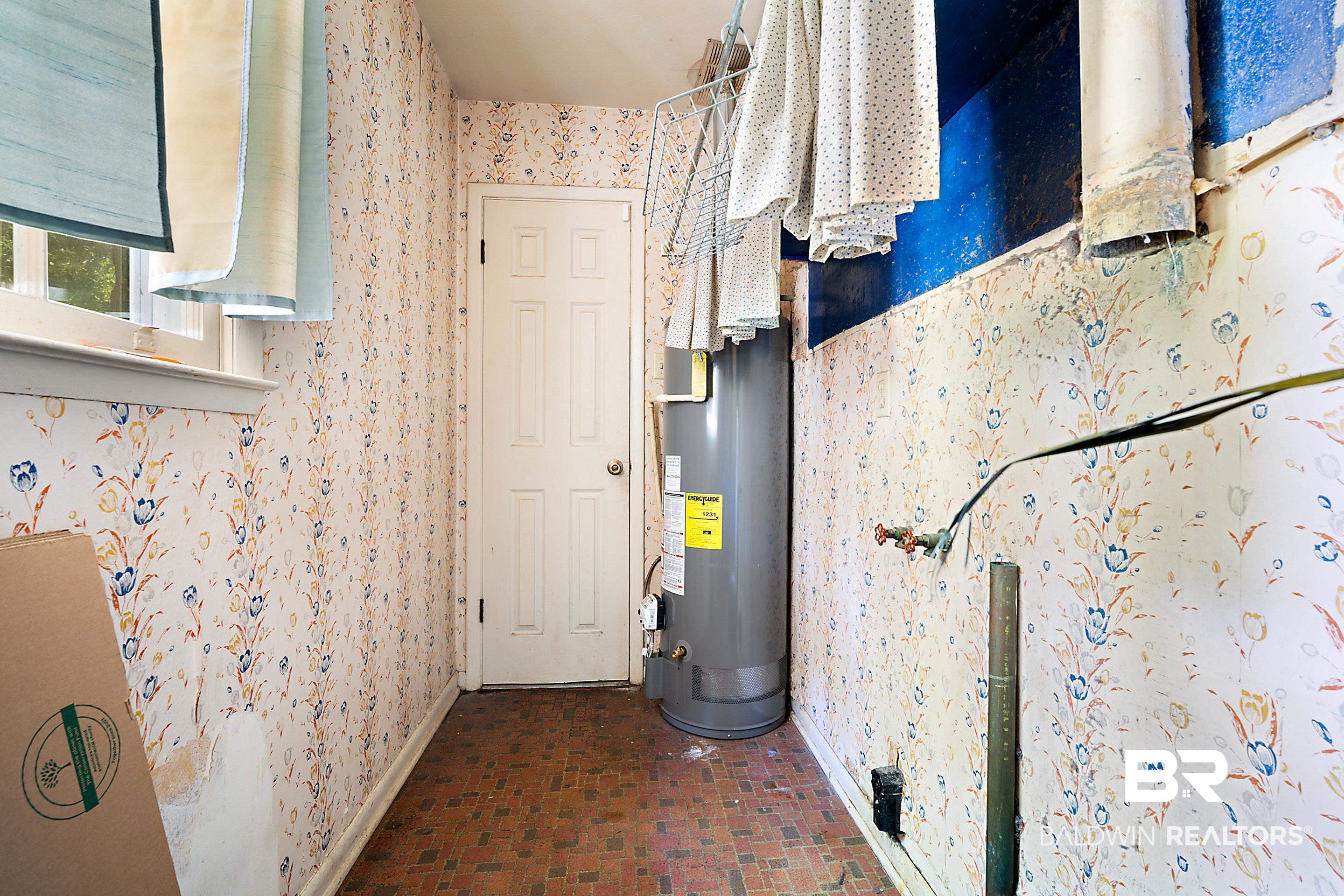 576 Markham Drive Mobile, AL 36609 - Photo 11 of 18 Utility room with gas water heater