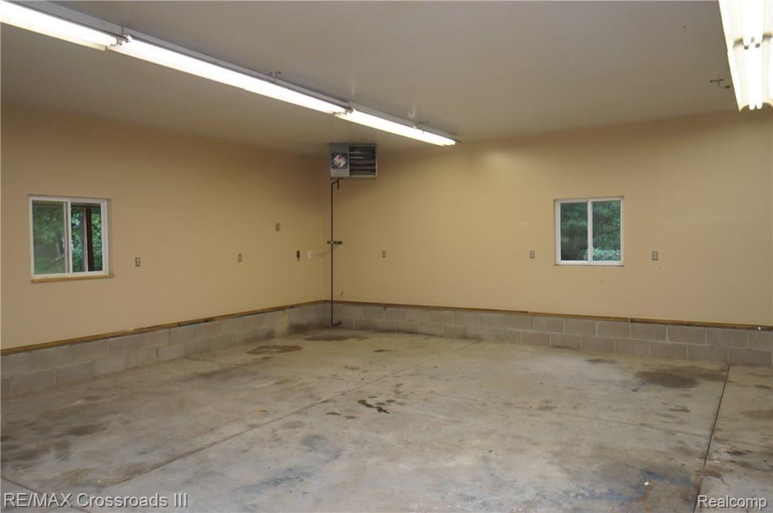 19234 Sumpter Road Belleville, MI 48111 - Photo 30 of 31 Inside oversized garage 2
