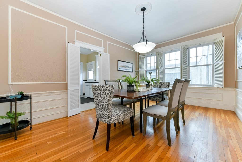 411 Washington Street, Unit 6 Brookline, MA 02446 - Photo 7 of 32 a dining room with furniture window wooden floor