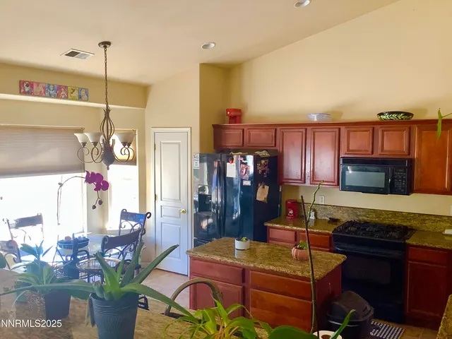 a room with furniture and a flat screen tv