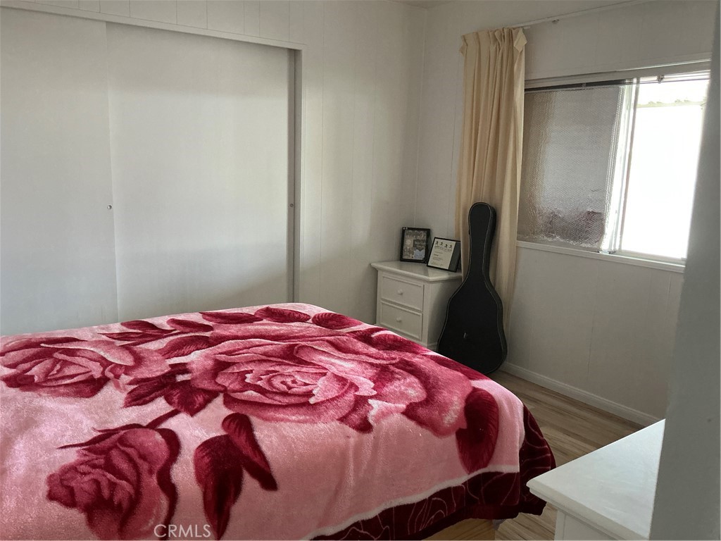 17625 Langlois Road, Unit SPACE 13 Desert Hot Springs, CA 92241 - Photo 13 of 47 a bedroom with a bed and a window