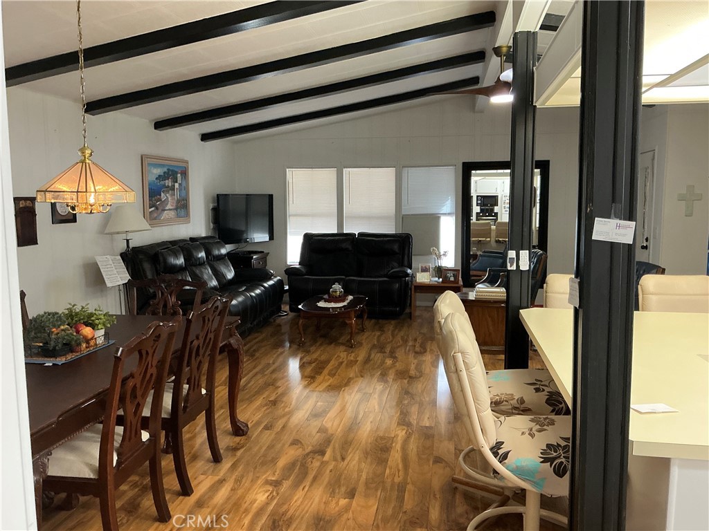 17625 Langlois Road, Unit SPACE 13 Desert Hot Springs, CA 92241 - Photo 23 of 47 a living room with furniture and a flat screen tv