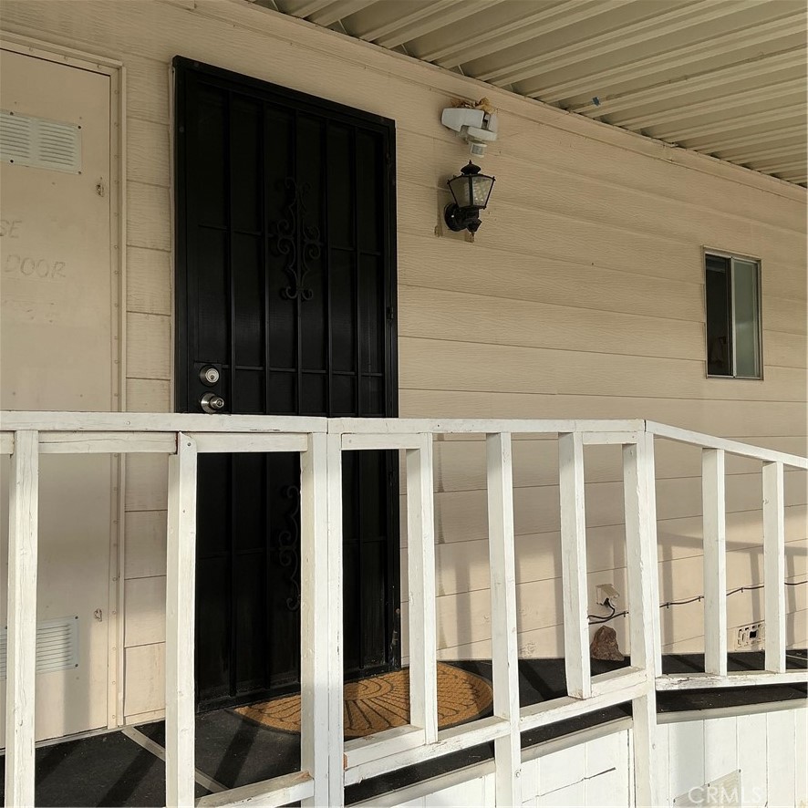 17625 Langlois Road, Unit SPACE 13 Desert Hot Springs, CA 92241 - Photo 25 of 47 a view of an entrance of the house