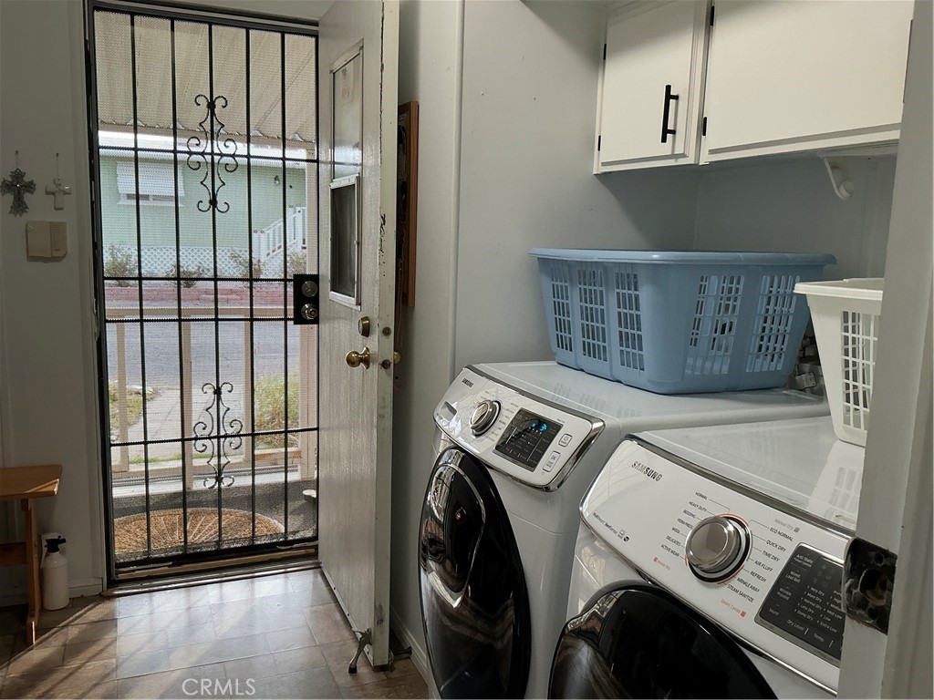 17625 Langlois Road, Unit SPACE 13 Desert Hot Springs, CA 92241 - Photo 26 of 47 a utility room with dryer and washer