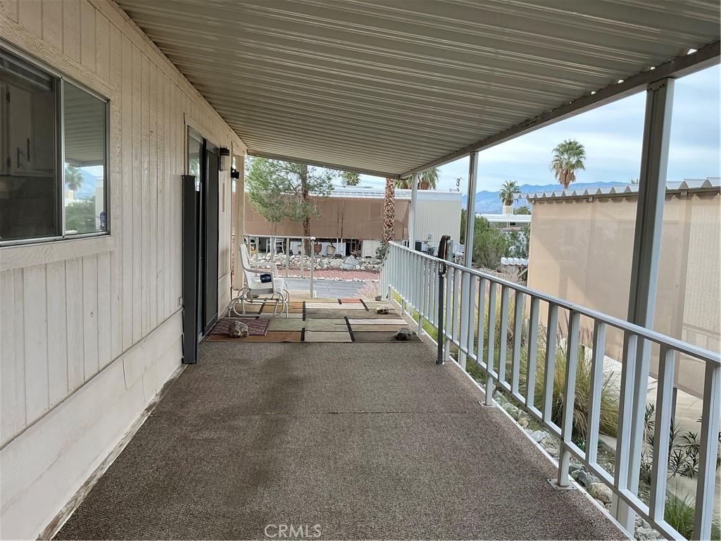 17625 Langlois Road, Unit SPACE 13 Desert Hot Springs, CA 92241 - Photo 30 of 47 a view of a porch with furniture