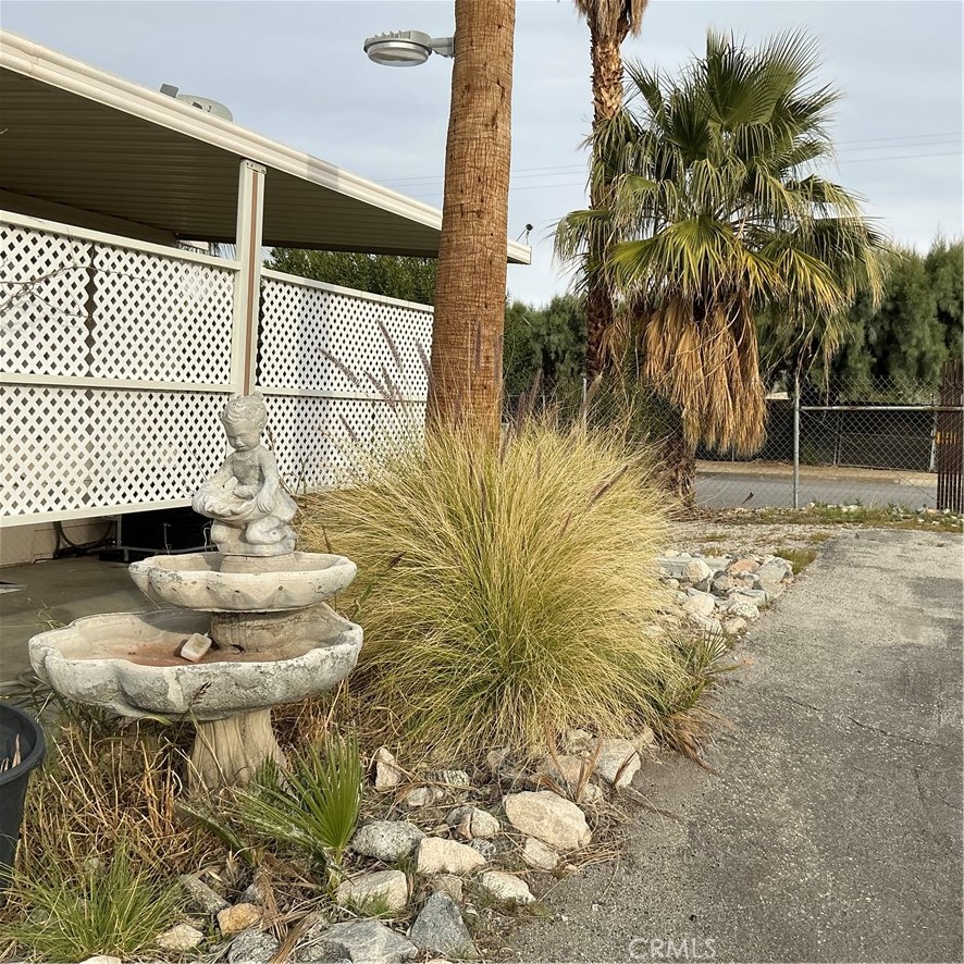 17625 Langlois Road, Unit SPACE 13 Desert Hot Springs, CA 92241 - Photo 33 of 47 a bathroom with a sink toilet and mirror
