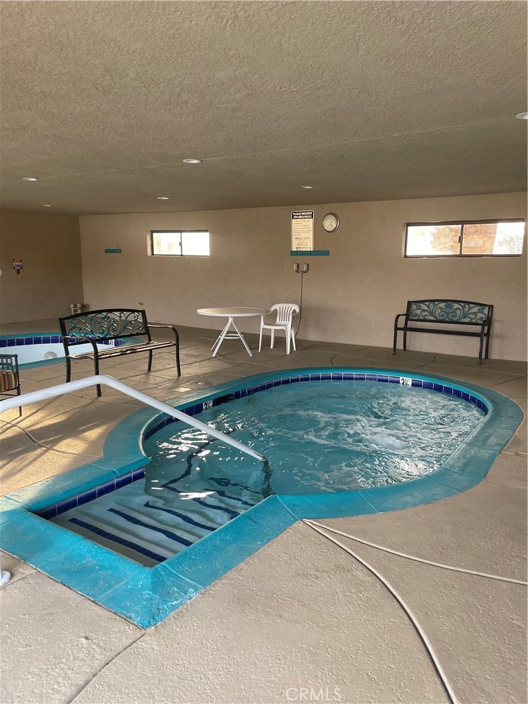 17625 Langlois Road, Unit SPACE 13 Desert Hot Springs, CA 92241 - Photo 42 of 47 a view of a living room and kitchen