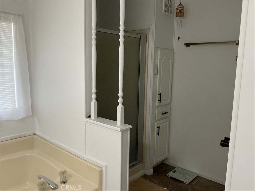 17625 Langlois Road, Unit SPACE 13 Desert Hot Springs, CA 92241 - Photo 8 of 47 a bathroom with a bathtub and shower