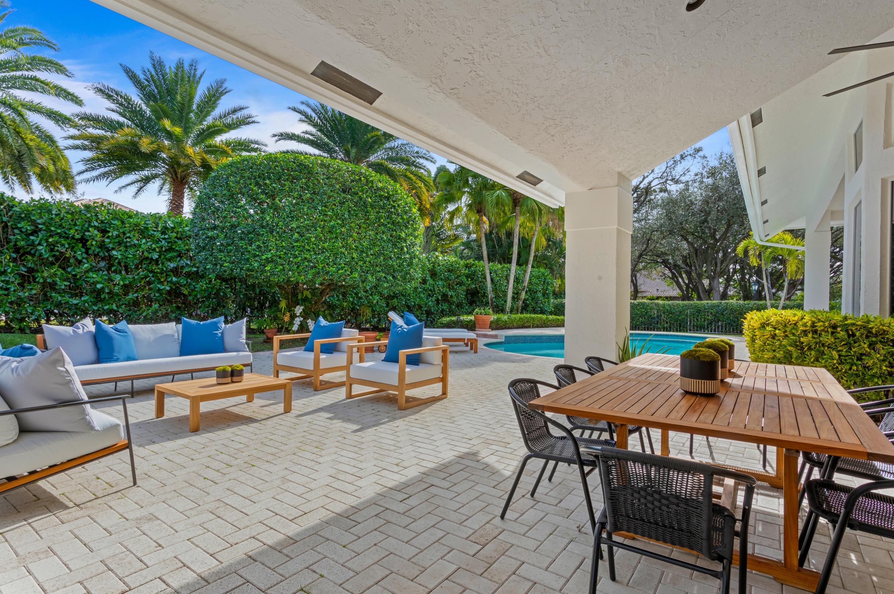 4210 Northwest 24th Way Boca Raton, FL 33431 - Photo 16 of 17 mls_LOGGIA_TO_PATIO_SEATING_ANGLE
