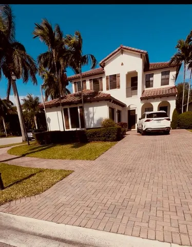 a view of a street with houses