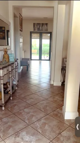 a view of livingroom with furniture and window