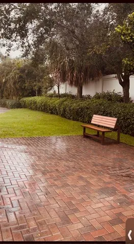 a view of a lake with a yard