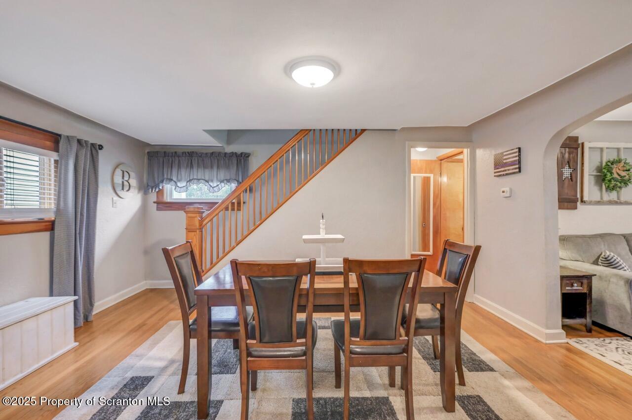 167 Handley Street Eynon, PA 18403 - Photo 12 of 48 a dining room with furniture and wooden floor