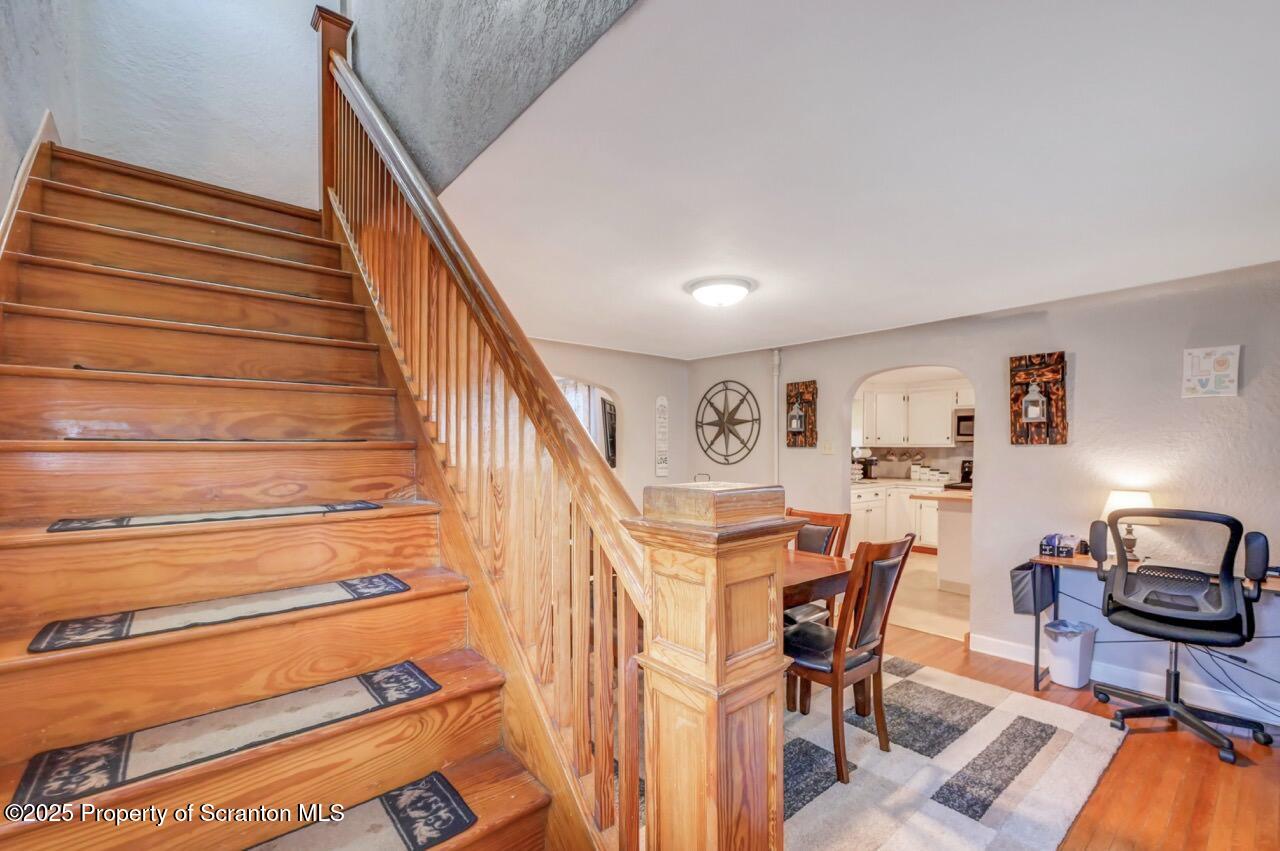 167 Handley Street Eynon, PA 18403 - Photo 23 of 48 a view of a livingroom with furniture and staircase