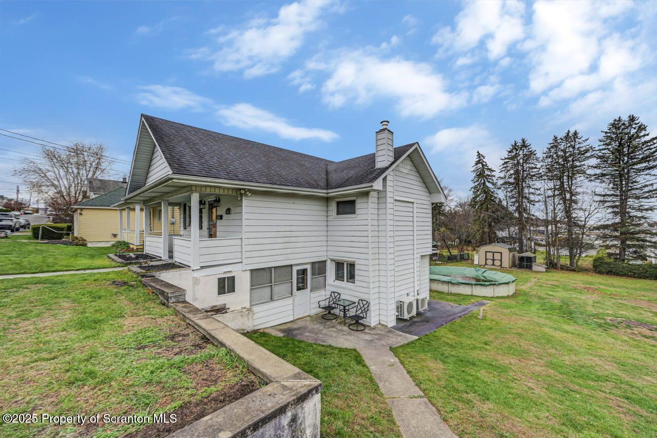 167 Handley Street Eynon, PA 18403 - Photo 3 of 48 a front view of house with yard and green space