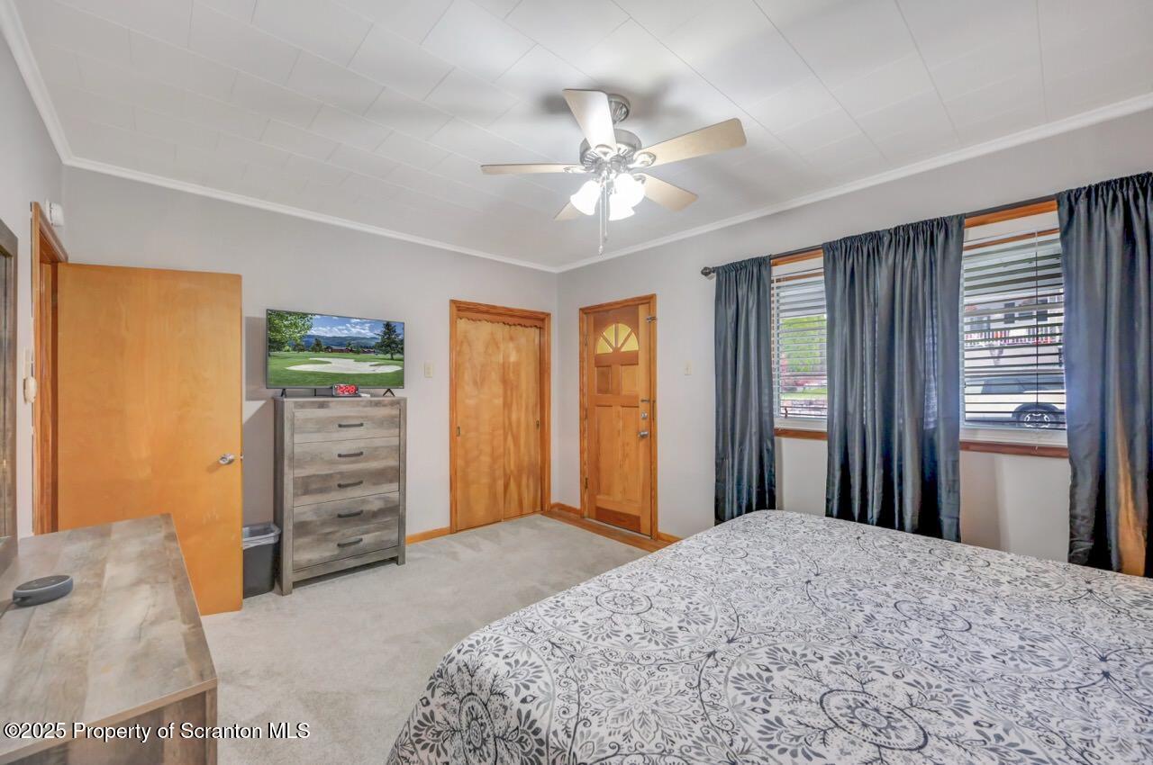 167 Handley Street Eynon, PA 18403 - Photo 31 of 48 a bedroom with furniture and window