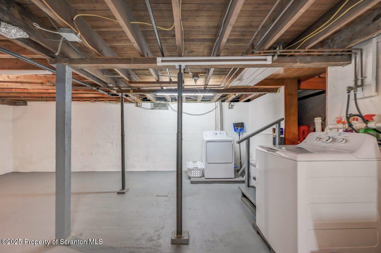 167 Handley Street Eynon, PA 18403 - Photo 35 of 48 a view of storage and utility room with a sink