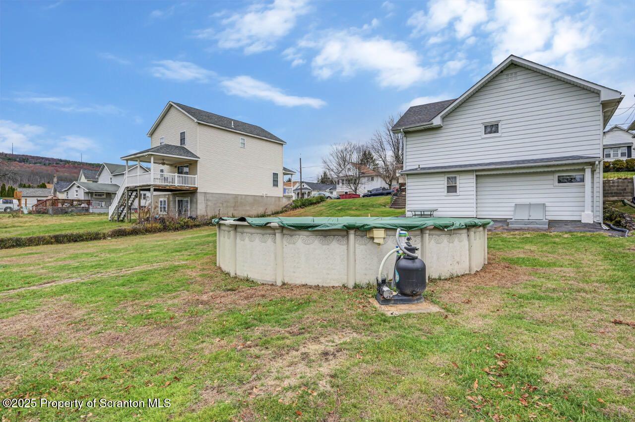 167 Handley Street Eynon, PA 18403 - Photo 47 of 48 a house view with a garden space