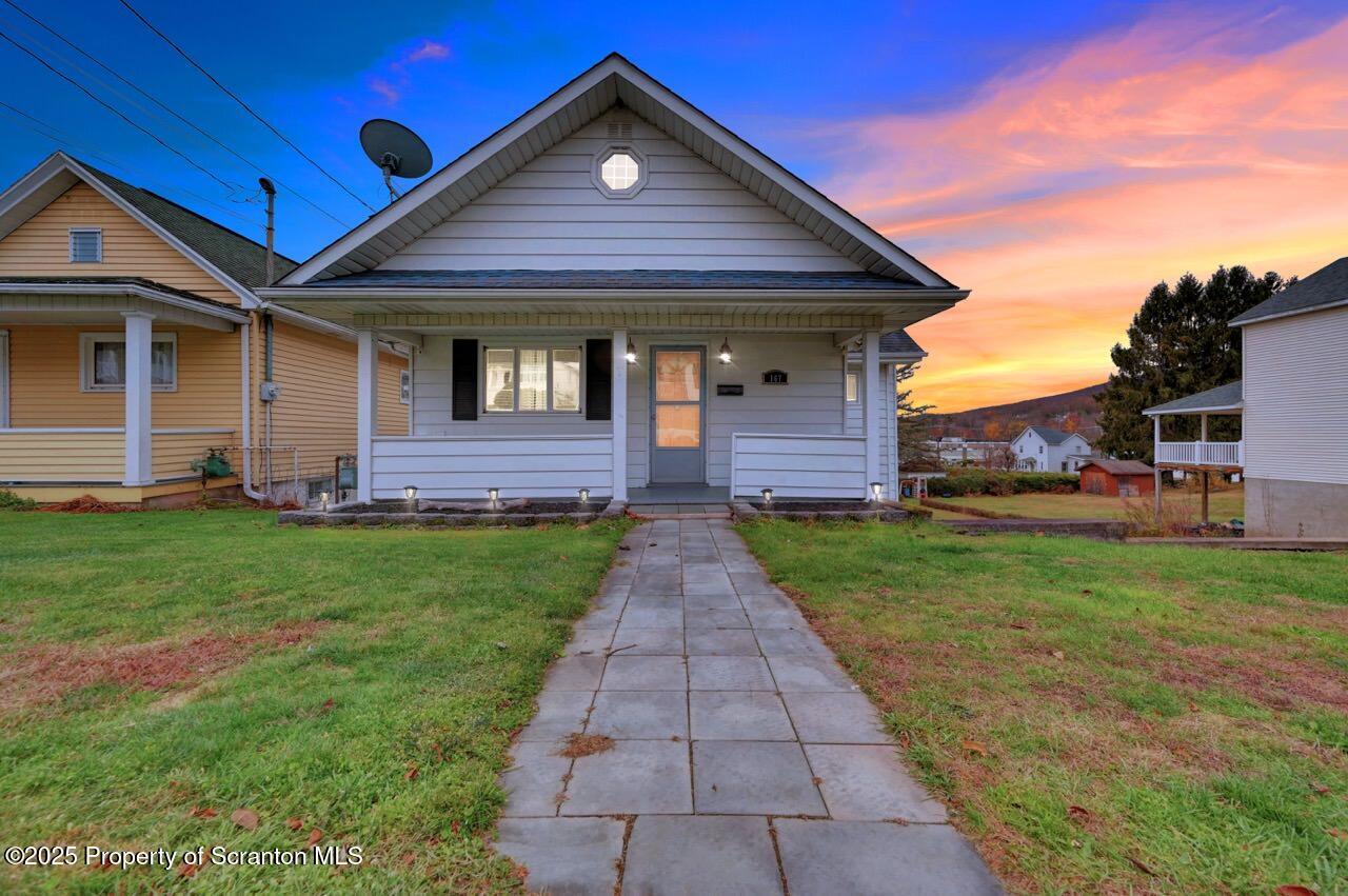 167 Handley Street Eynon, PA 18403 - Photo 48 of 48 a front view of a house with garden