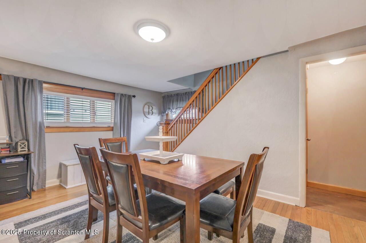 167 Handley Street Eynon, PA 18403 - Photo 10 of 48 a view of a dining room with furniture and a window