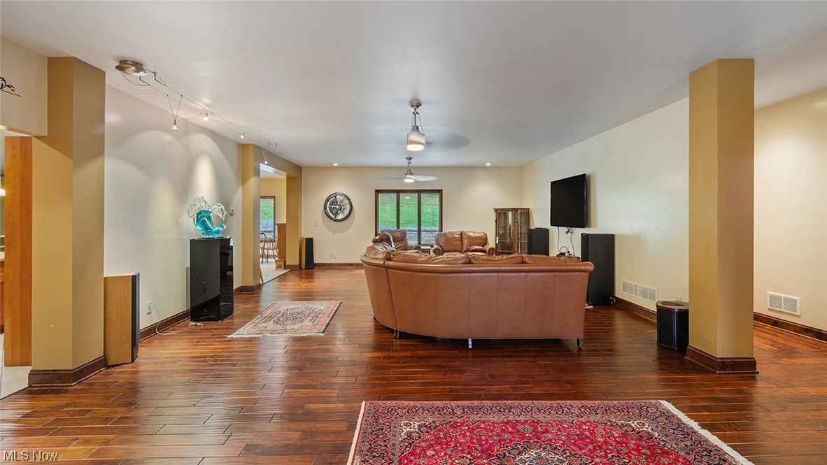 57430 Ohio Riverview Road Shadyside, OH 43947 - Photo 7 of 35 Living room with hardwood floors and rail lighting