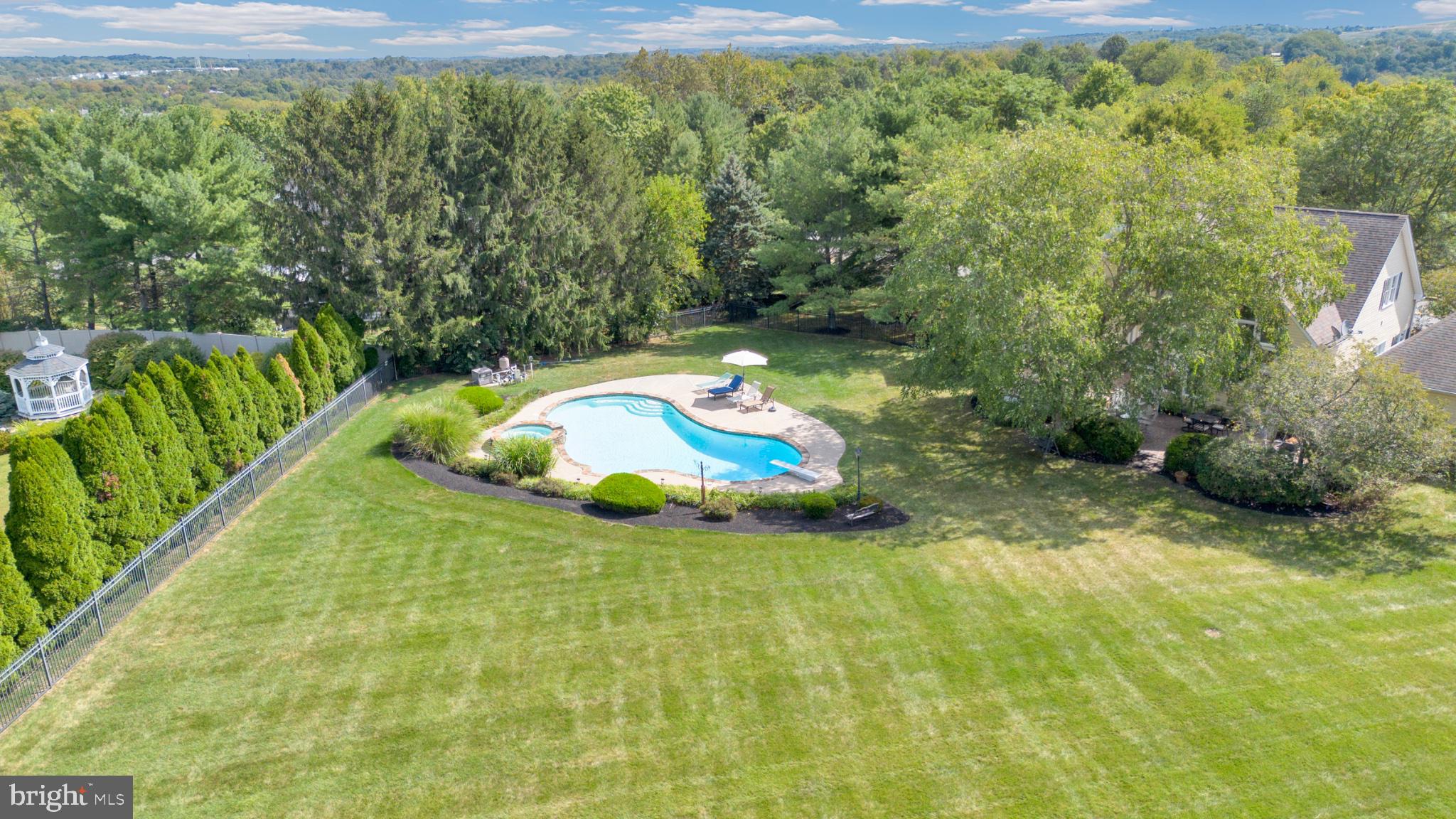 112 South Mennonite Road Collegeville, PA 19426 - Photo 101 of 131 Serene backyard oasis with pool.