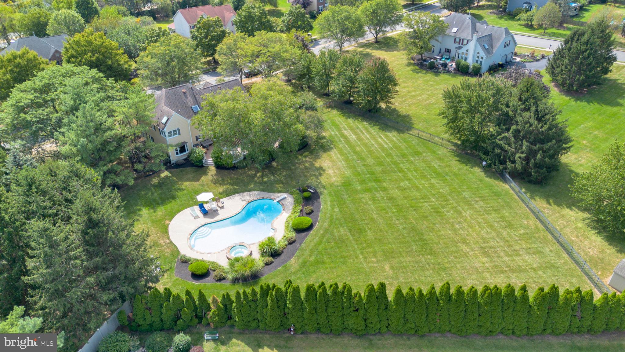 112 South Mennonite Road Collegeville, PA 19426 - Photo 102 of 131 Serene backyard oasis with pool.