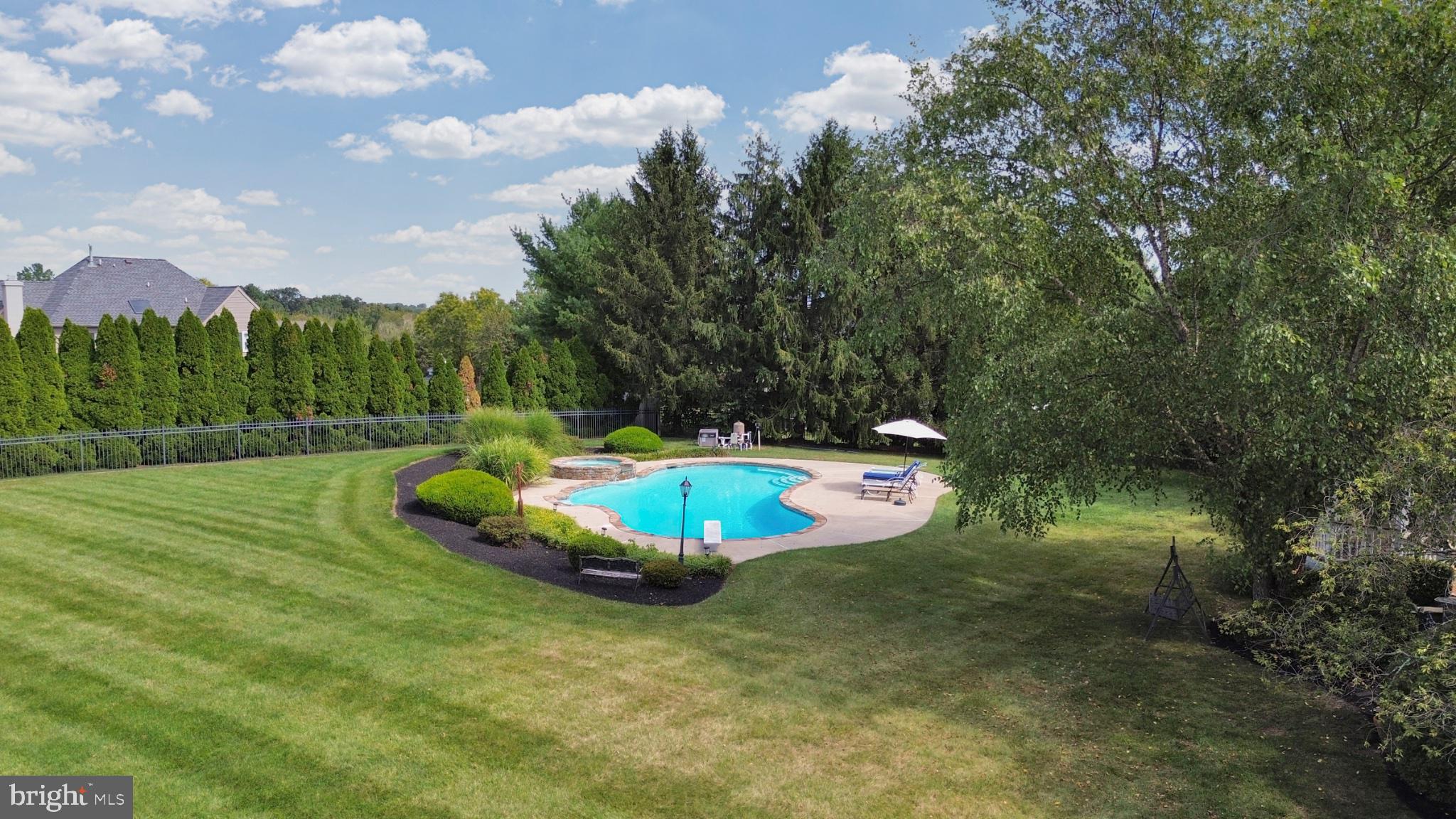 112 South Mennonite Road Collegeville, PA 19426 - Photo 106 of 131 Serene backyard oasis with pool.