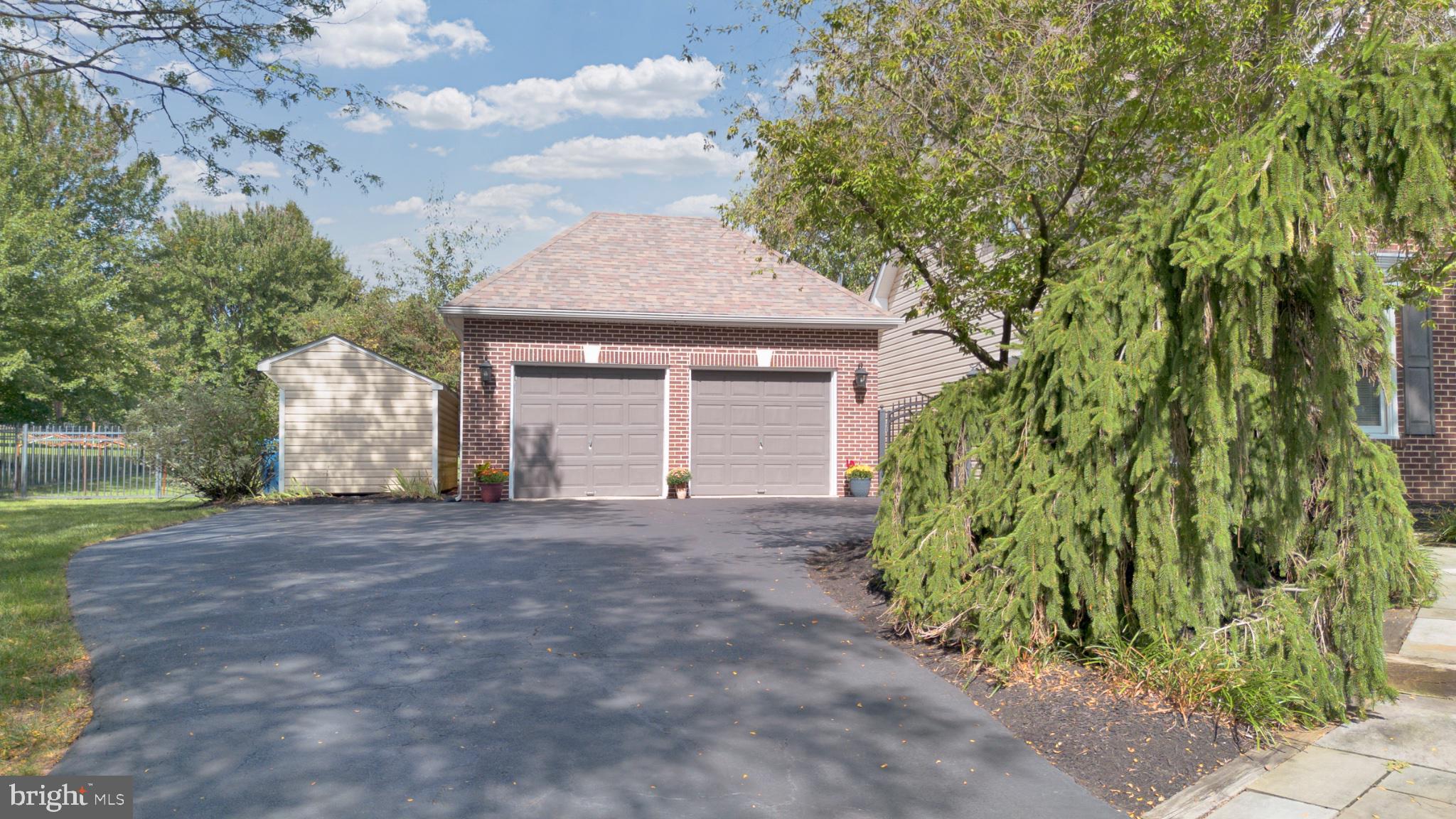 112 South Mennonite Road Collegeville, PA 19426 - Photo 12 of 131 Charming home with lush greenery.