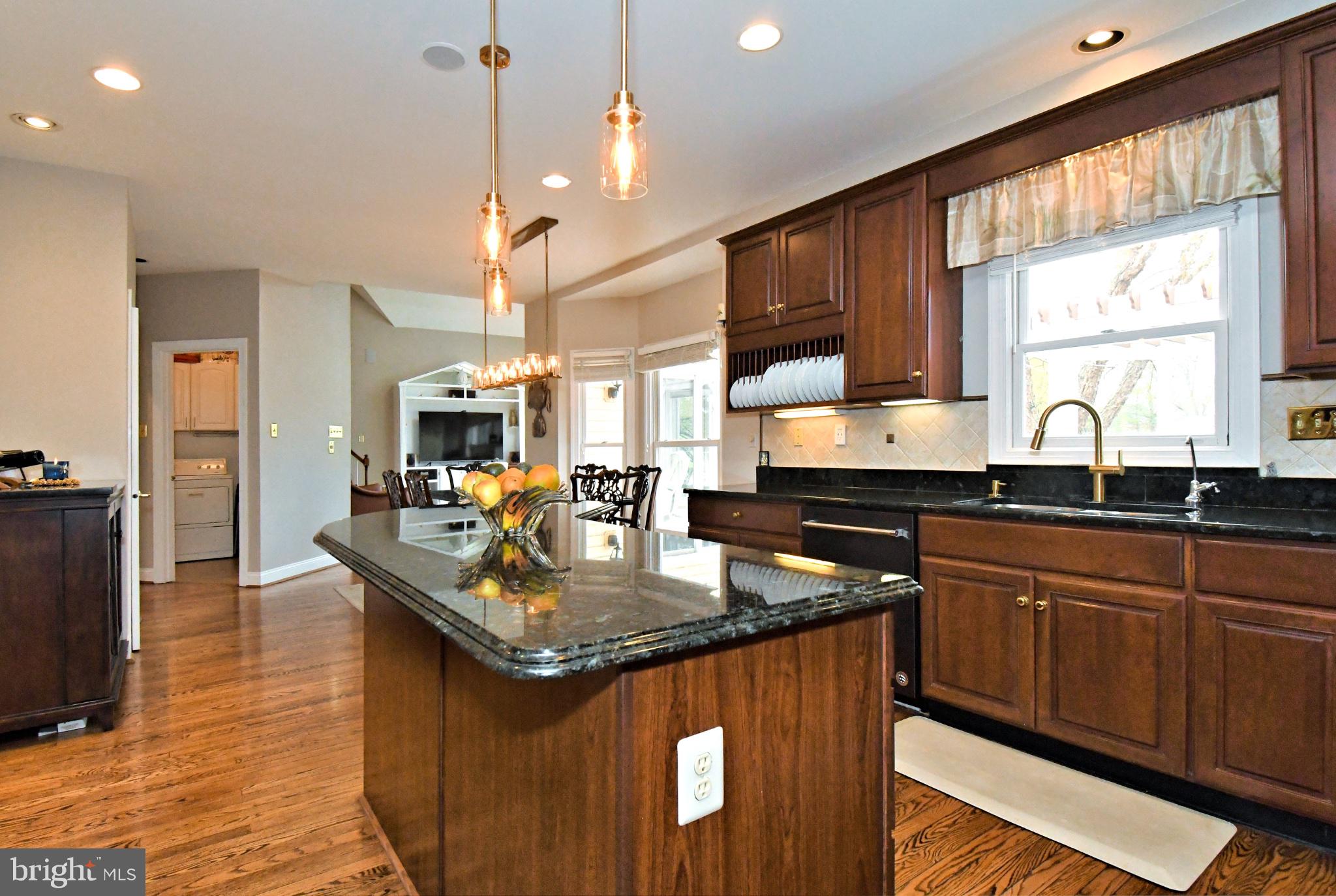 112 South Mennonite Road Collegeville, PA 19426 - Photo 24 of 131 Elegant kitchen with rich wood tones.