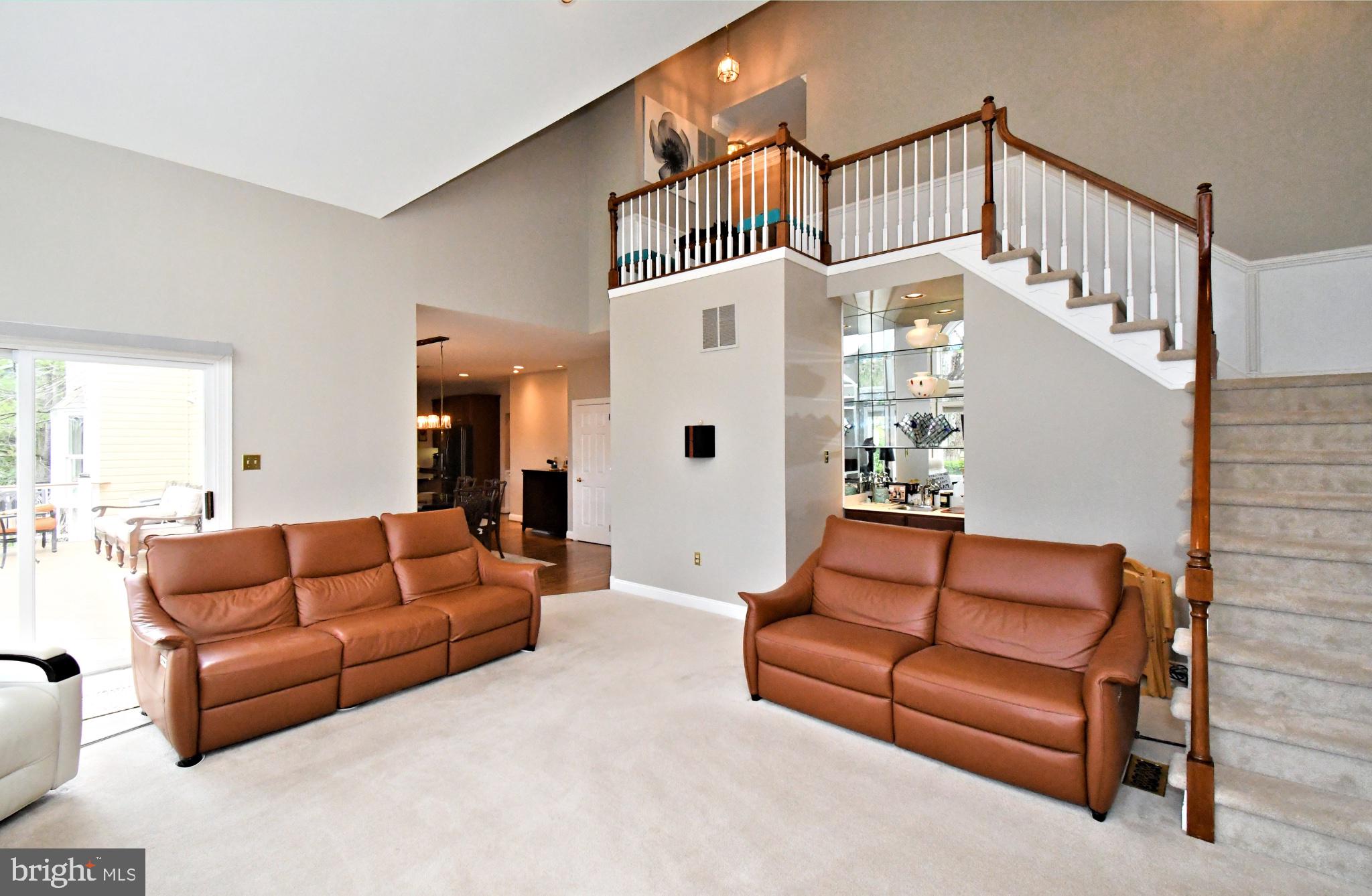 112 South Mennonite Road Collegeville, PA 19426 - Photo 41 of 131 Spacious living area with elegant staircase.