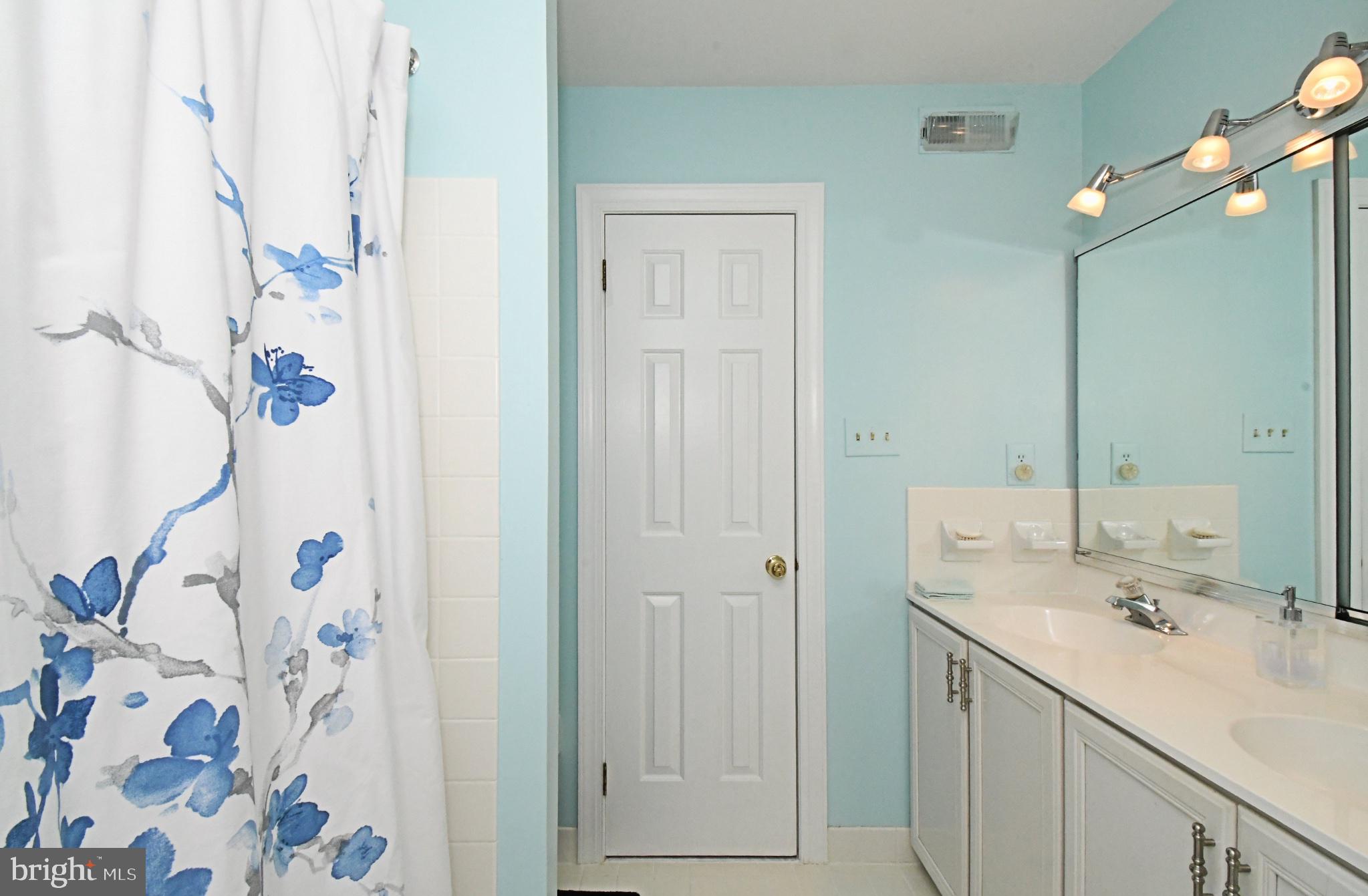 112 South Mennonite Road Collegeville, PA 19426 - Photo 81 of 131 Serene blue-hued bathroom retreat.