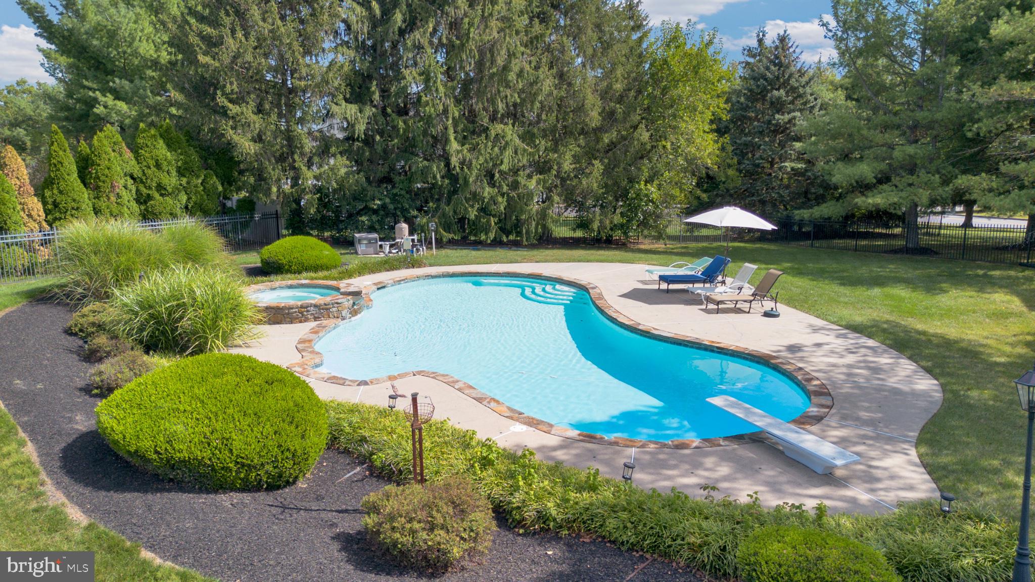 112 South Mennonite Road Collegeville, PA 19426 - Photo 100 of 131 Serene backyard oasis with pool.