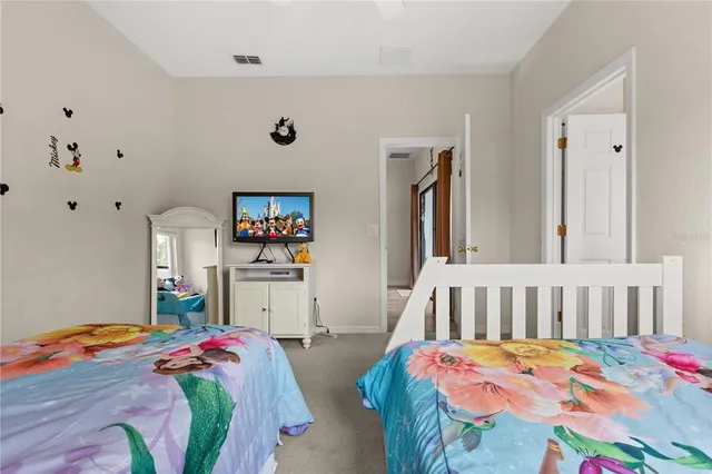 a bathroom with a sink a vanity and a mirror