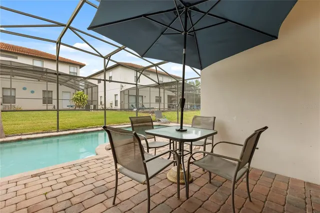 a view of chair and tables in the patio