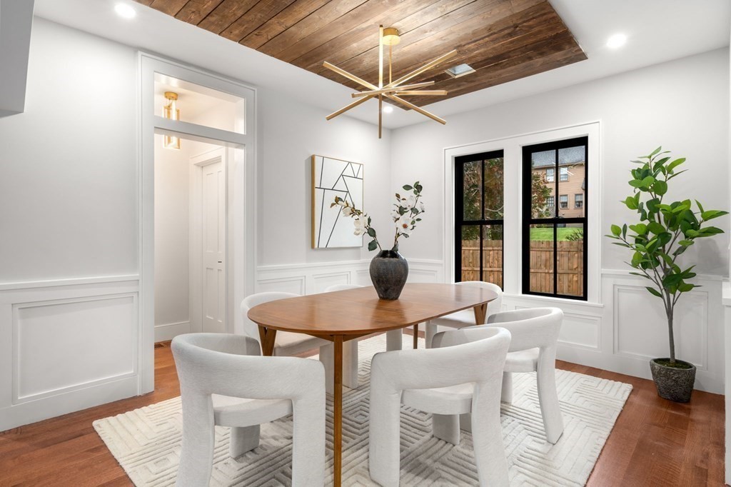 300 Elliot Street, Unit 2 Newton, MA 02464 - Photo 7 of 16 a dining room with furniture and window