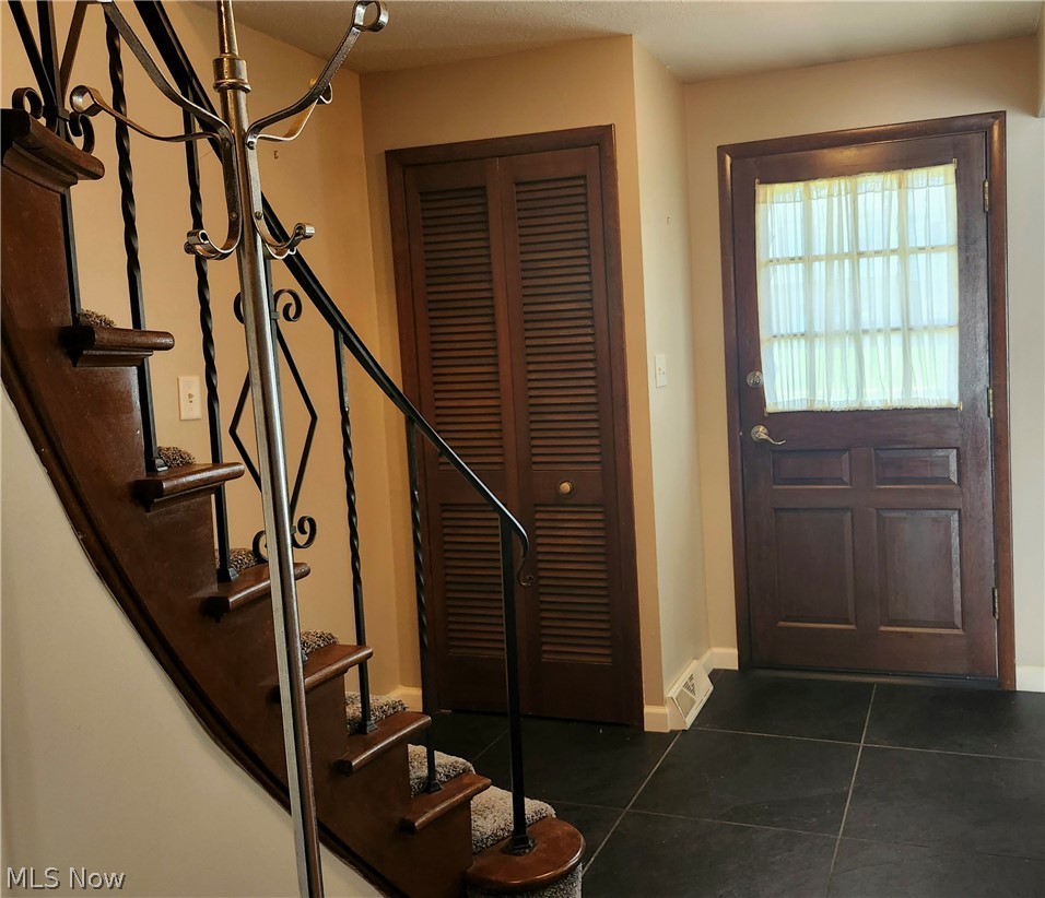 6488 State Road, Unit B 12 Cleveland, OH 44134 - Photo 16 of 46 View of tiled foyer