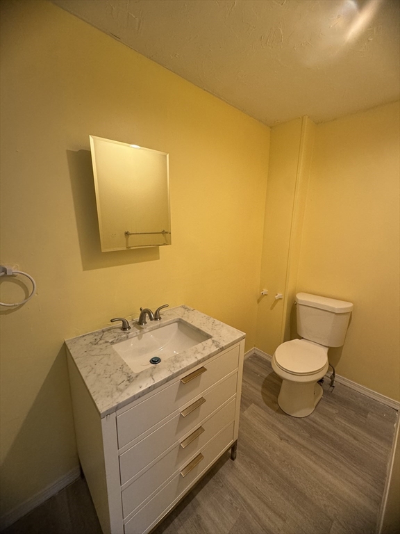 20 Temple Street, Unit 1 Fitchburg, MA 01420 - Photo 14 of 14 a bathroom with a sink and a toilet