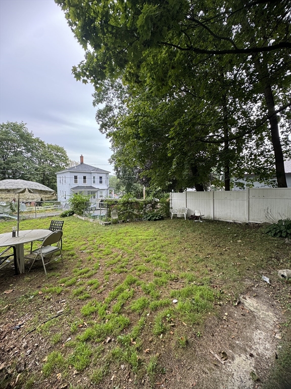 20 Temple Street, Unit 1 Fitchburg, MA 01420 - Photo 2 of 14 a view of a backyard with swimming pool