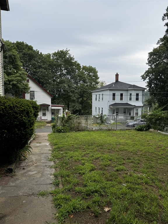20 Temple Street, Unit 1 Fitchburg, MA 01420 - Photo 3 of 14 a front view of a house with garden