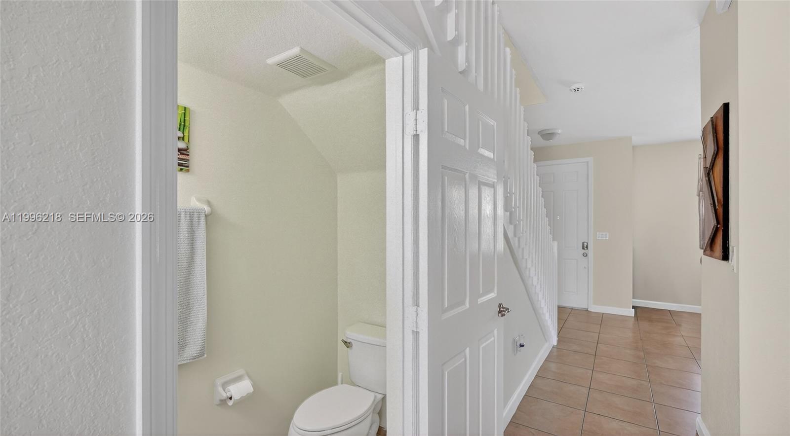 9041 Southwest 227th Street, Unit 5 Cutler Bay, FL 33190 - Photo 21 of 41 a bathroom with a shower and a toilet